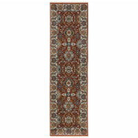 2' X 8' Red Blue Ivory Gold And Navy Oriental Power Loom Stain Resistant Runner Rug With Fringe