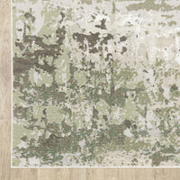 10' X 13' Beige Grey Brown And Sage Green Abstract Power Loom Stain Resistant Area Rug