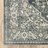 5' X 7' Beige Grey And Blue Oriental Power Loom Stain Resistant Area Rug