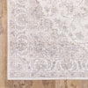 5' X 7' Beige Gold And Grey Oriental Power Loom Stain Resistant Area Rug