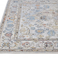 7' X 10' Taupe Blue And Gray Floral Stain Resistant Area Rug