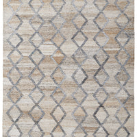 5' X 8' Gray Ivory And Tan Geometric Hand Woven Stain Resistant Area Rug With Fringe