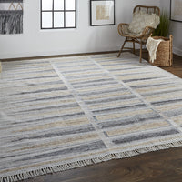 5' X 8' Tan Gray And Taupe Geometric Hand Woven Stain Resistant Area Rug With Fringe