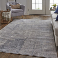 5' X 8' Taupe Tan And Blue Abstract Power Loom Distressed Stain Resistant Area Rug