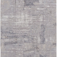 7' X 9' Taupe Tan And Blue Abstract Power Loom Distressed Stain Resistant Area Rug