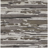 5' X 8' Brown And Ivory Abstract Power Loom Distressed Stain Resistant Area Rug