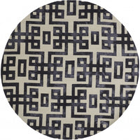 10' Ivory And Black Round Wool Tufted Handmade Stain Resistant Area Rug