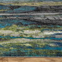 5' X 8' Blue Green And Taupe Stain Resistant Area Rug