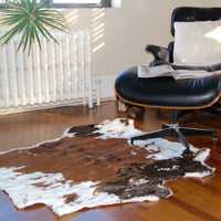 4' x 5' Faux Cow Hide Brown And White Area Rug