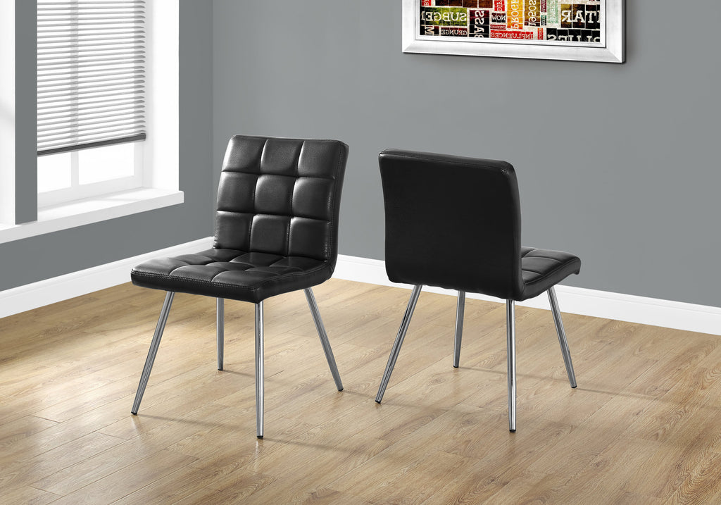 Two 31.5" Black Leather Look, Foam, Polyurethane, and Metal Dining Chairs