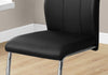 Two 77.5" Black Leather Look, Chrome Metal, and Foam Dining Chairs