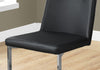 Two 34" Black Leather Look and Foam Dining Chairs with Chrome Legs