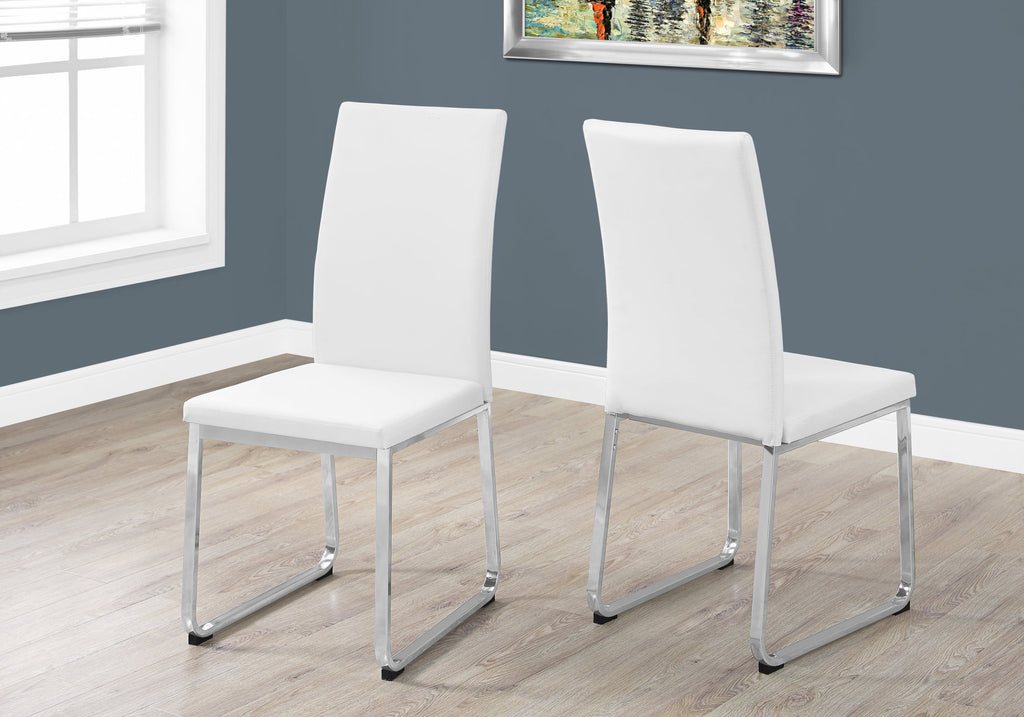 Two 39.5" White Leather Look, Foam, and Chrome Metal Dining Chairs