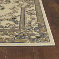 7'7" x 10'10" Polypropelene Ivory-Blue Area Rug