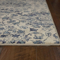 7'10" x 11'2" Polypropelene Ivory-Blue Area Rug