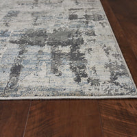 7'7" x 10'10" Polyester Ivory-Teal Area Rug