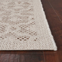 5' x 7'7" Polypropelene Beige Area Rug