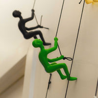 6" x 3" x 3" Resin Green Climbing Man