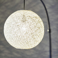 Floor Lamp with Bronze Metal Arc and Groovy Rattan String Ball Shade