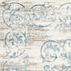 7'x10' Ivory Blue Machine Woven Distressed Traditional Indoor Area Rug