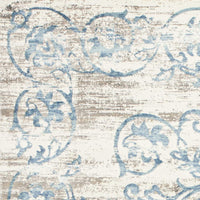 7'x10' Ivory Blue Machine Woven Distressed Traditional Indoor Area Rug