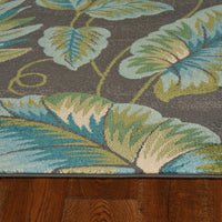 8'x11' Grey Teal Machine Woven Tropical Leaves Indoor Area Rug