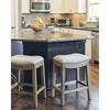 Counter Height Saddle Style Counter Stool with Taupe Fabric and Nail head Trim