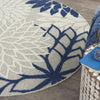 4’ Round Ivory and Navy Indoor Outdoor Area Rug