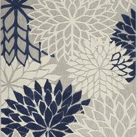 5’ x 8’ Ivory and Navy Indoor Outdoor Area Rug