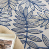 5’ x 7' Ivory and Navy Leaves Indoor Outdoor Area Rug