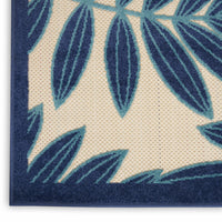 7’ x 10’ Navy and Beige Leaves Indoor Outdoor Area Rug