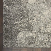 8’ x 10’ Charcoal and Ivory Abstract Area Rug