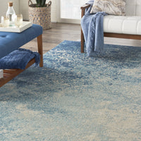 7’ x 10’ Light Blue and Ivory Abstract Sky Area Rug