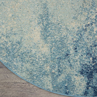 8’ Round Light Blue and Ivory Abstract Sky Area Rug