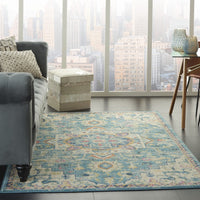 7’ x 10’ Light Blue and Ivory Distressed Area Rug