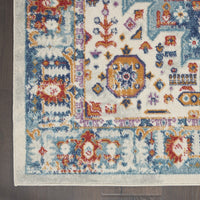 8’ x 10’ Ivory and Blue Floral Motifs Area Rug