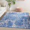 4’ x 6’ Blue and Ivory Abstract Splash Area Rug