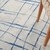 4’ x 6’ Ivory and Blue Irregular Grids Area Rug