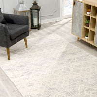 8’ x 11’ Ivory Distressed Ikat Pattern Area Rug