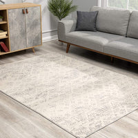 8’ x 11’ Ivory Distressed Ikat Pattern Area Rug