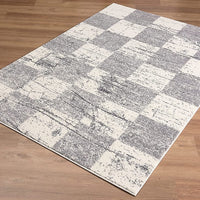 5’ x 8’ White and Gray Checkered Area Rug