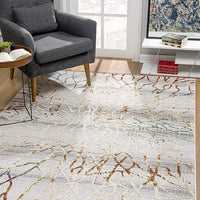 8’ x 11’ Gold and Ivory Abstract Branches Area Rug