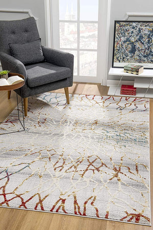 8’ x 11’ Gold and Ivory Abstract Branches Area Rug