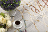 8’ x 11’ Gold and Ivory Abstract Branches Area Rug