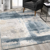 2’ x 4’ Cream and Blue Abstract Patches Area Rug