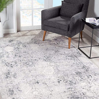 5’ x 8’ Gray and Ivory Abstract Distressed Area Rug