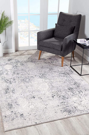 7’ x 10’ Gray and Ivory Abstract Distressed Area Rug