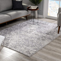 7’ x 10’ Cream and Gray Faded Filigree Area Rug