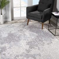 2’ x 4’ Cream and Gray Faded Filigree Area Rug