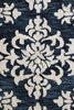 7’ x 9’ Blue and Ivory Decorative Area Rug